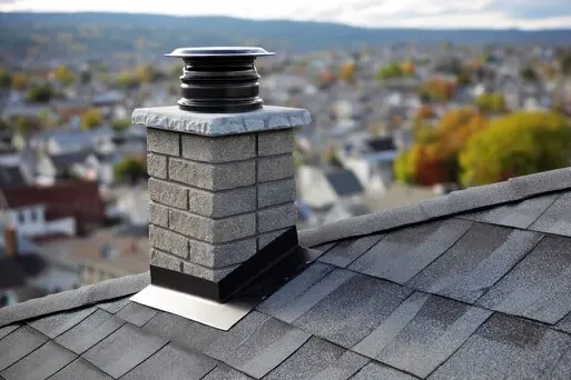 Stone chimney with a new cap near Chautauqua in Boulder
